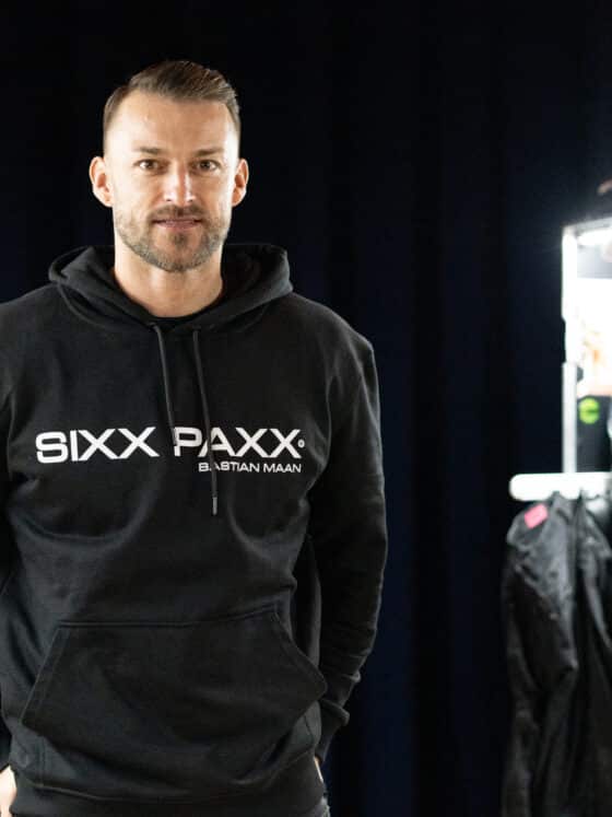 Sebastian Corsten, co-owner of SIXX PAXX, in the costume backstage area