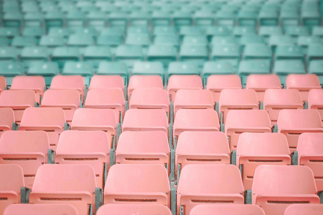 Rows of seats with different coloured tiers